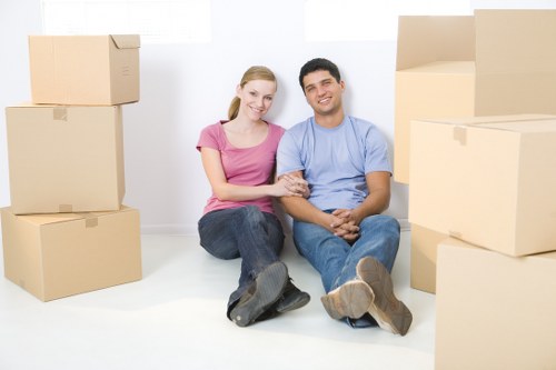 Professional movers handling furniture during a local move
