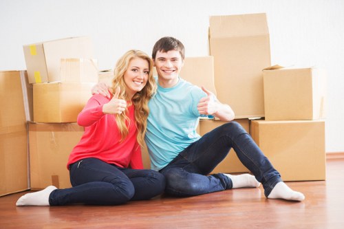 Organised storage unit with boxes and furniture in Chingford